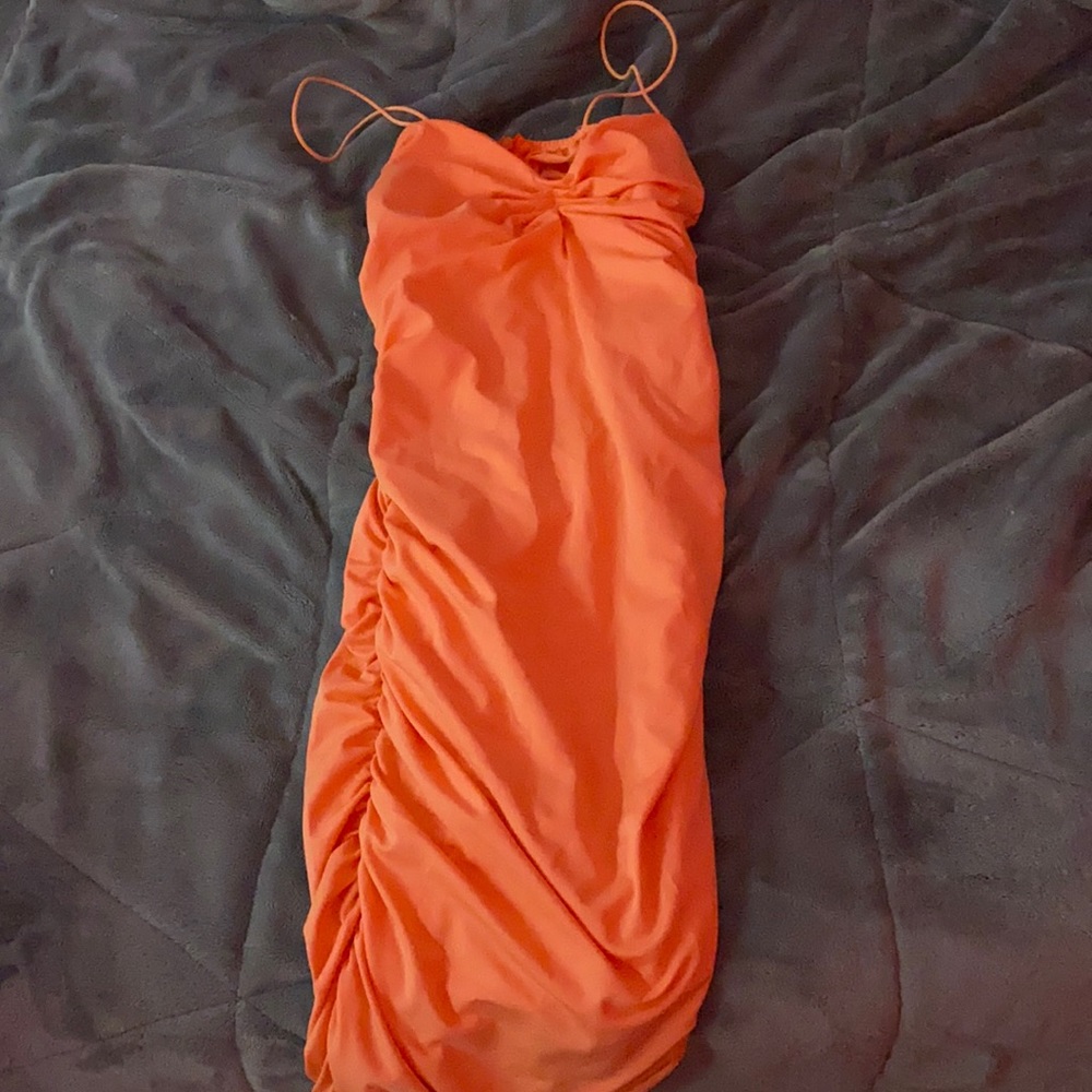 Cute tight orange dress!